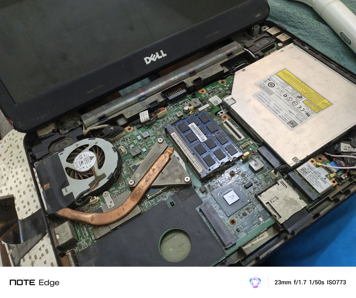 Laptop opened for hands-on hardware repair