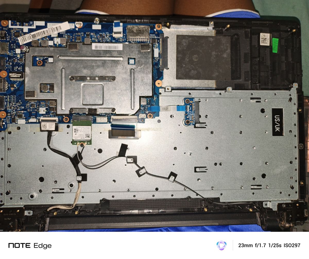 Laptop motherboard removed for board-level repair